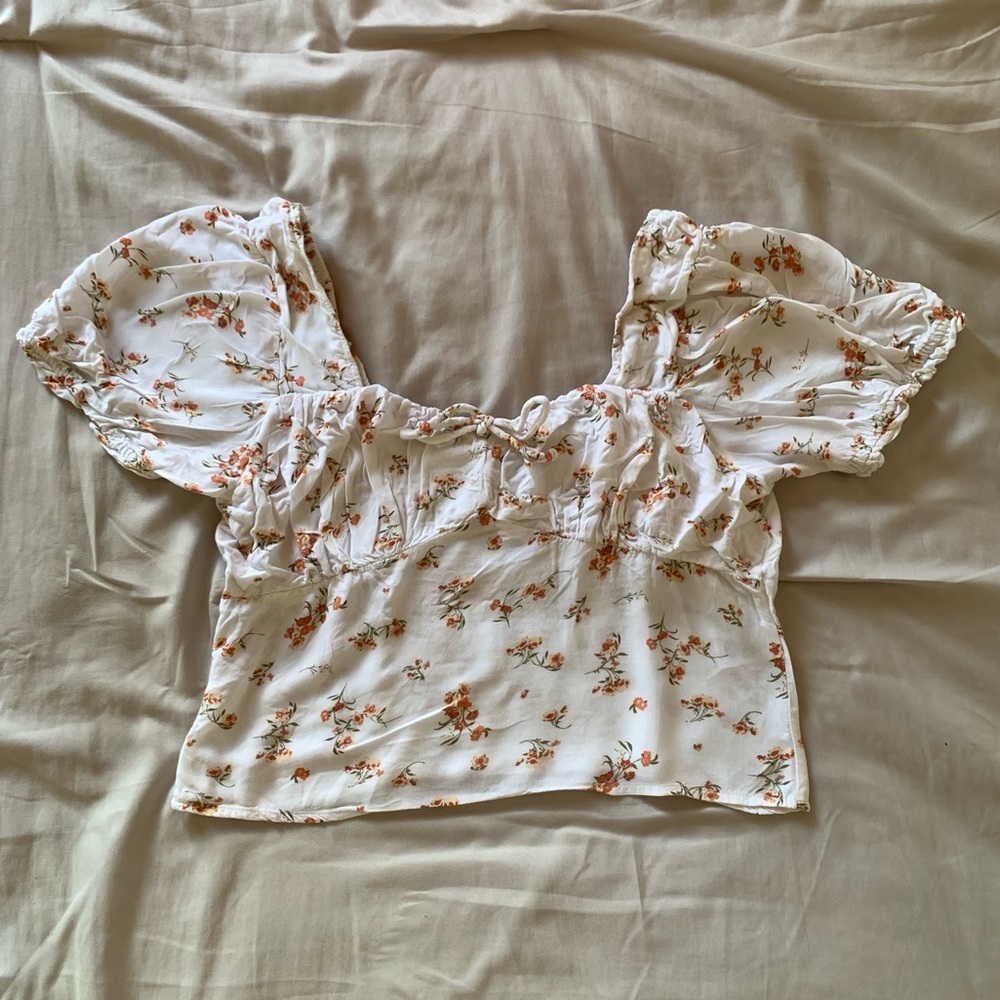 White Puff Sleeve Blouse with Floral Prints:
• Size: Large